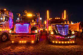 Trucks With Colourful Lights Stock Photo - Download Image Now - Semi-Truck,  Illuminated, Lighting Equipment - iStock
