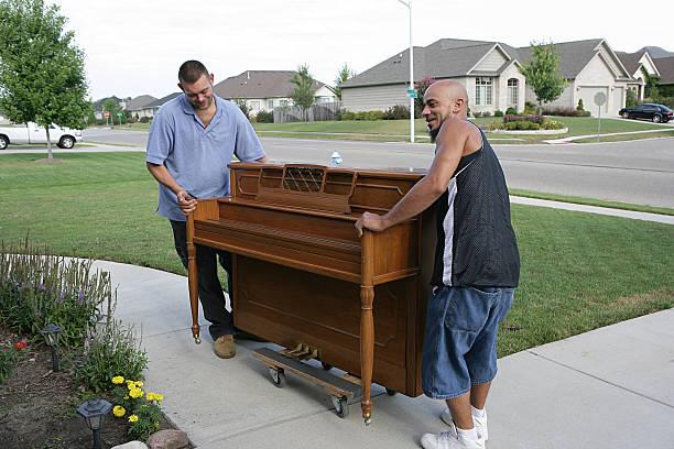 Piano Moving  movers piano stock pictures, royalty-free photos & images