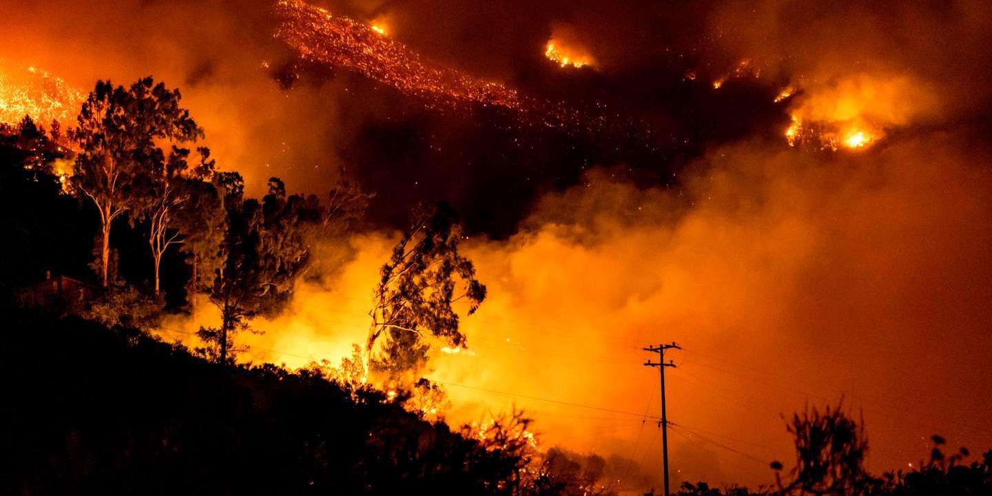 The Cave fire burns a hillside in Santa Barbara, California        on November 26, 2019. The wind-driven brush fire that started        late on November 25, 2019 in Los Padres National Forest near        Highway 154 in Santa Barbara County moved quickly downhill,        prompting mandatory evacuations and threatening homes. / AFP /        Kyle Grillot