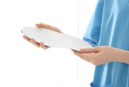 femaleorthopedistwithinsole.jpg