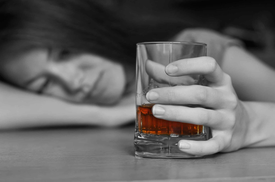 sadwomandrinkingweb.jpg