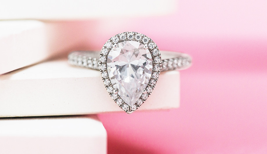 pearshapeddiamondscoverpavehaloshankdiamondengagementring.jpg