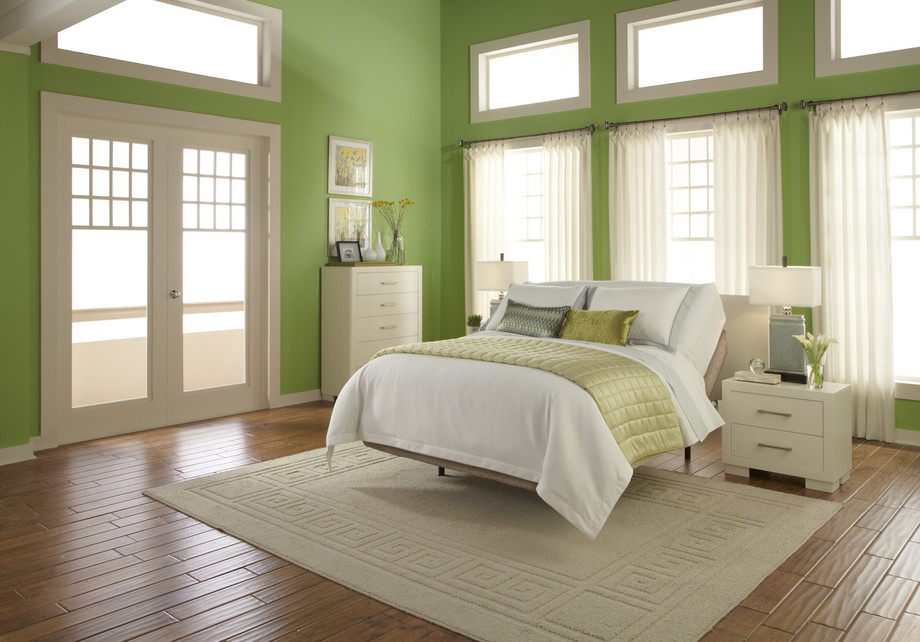 faboulusmasterbedroomdecorwithgreenwallpaintcombinewhiteframewindowalsowhitebeddingsetsonwoodenparquetflooring.jpg