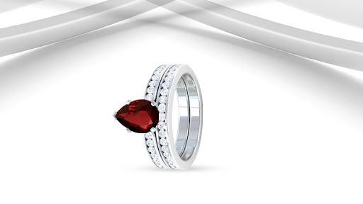 ruby ring and a metal band ring set